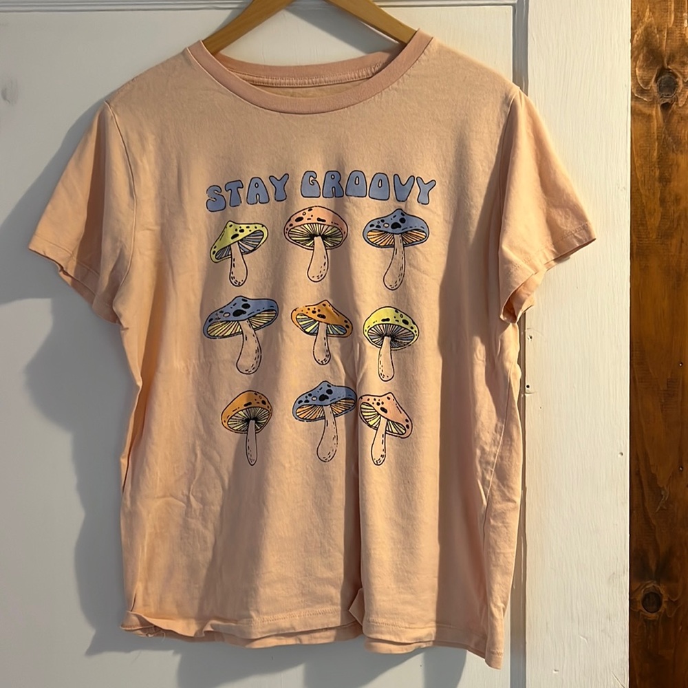 Stay Groovy mushroom peach colored shirt